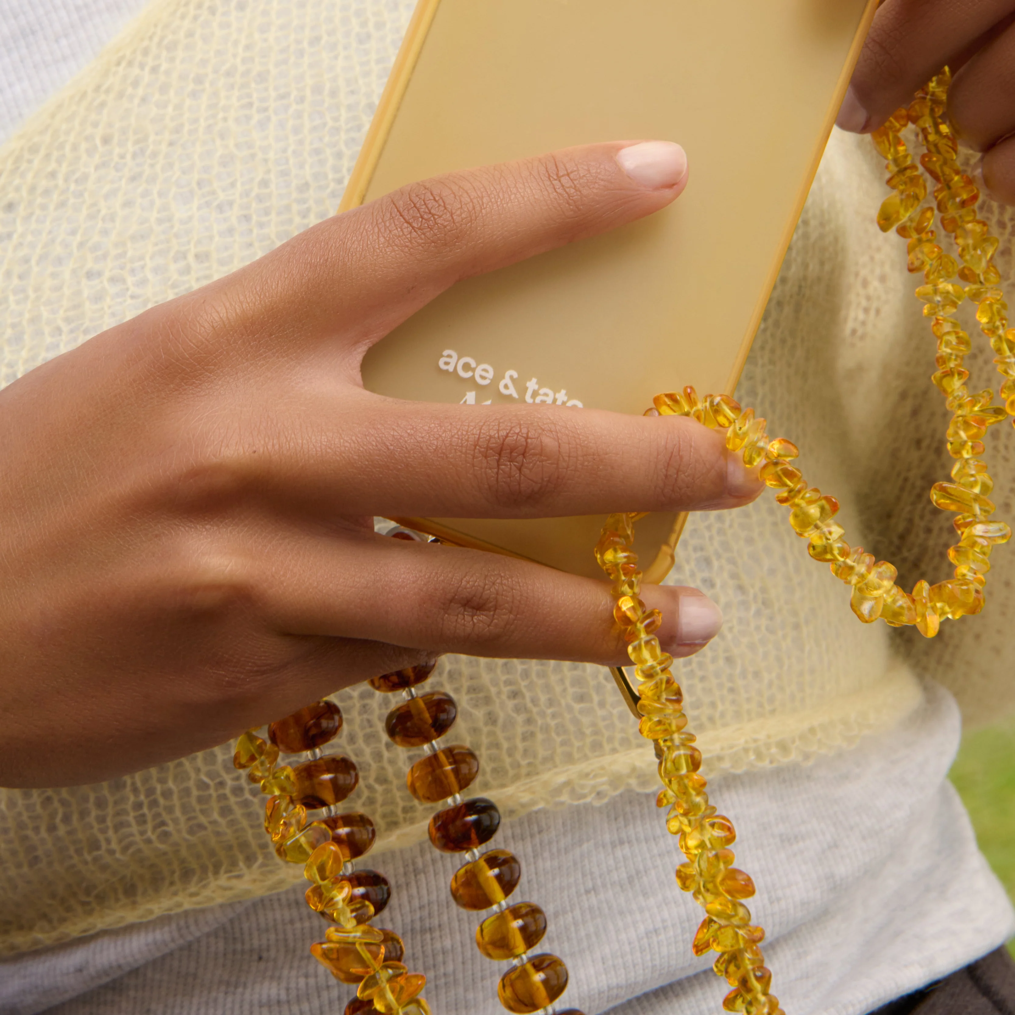 Mellow yellow iPhone case with Sunbeads and Honeycomb cord - Image 4